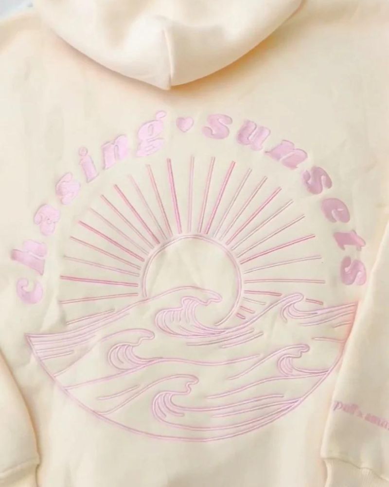 CHASING SUNSETS - ELEGANTE FELPA CON CAPPUCCIO